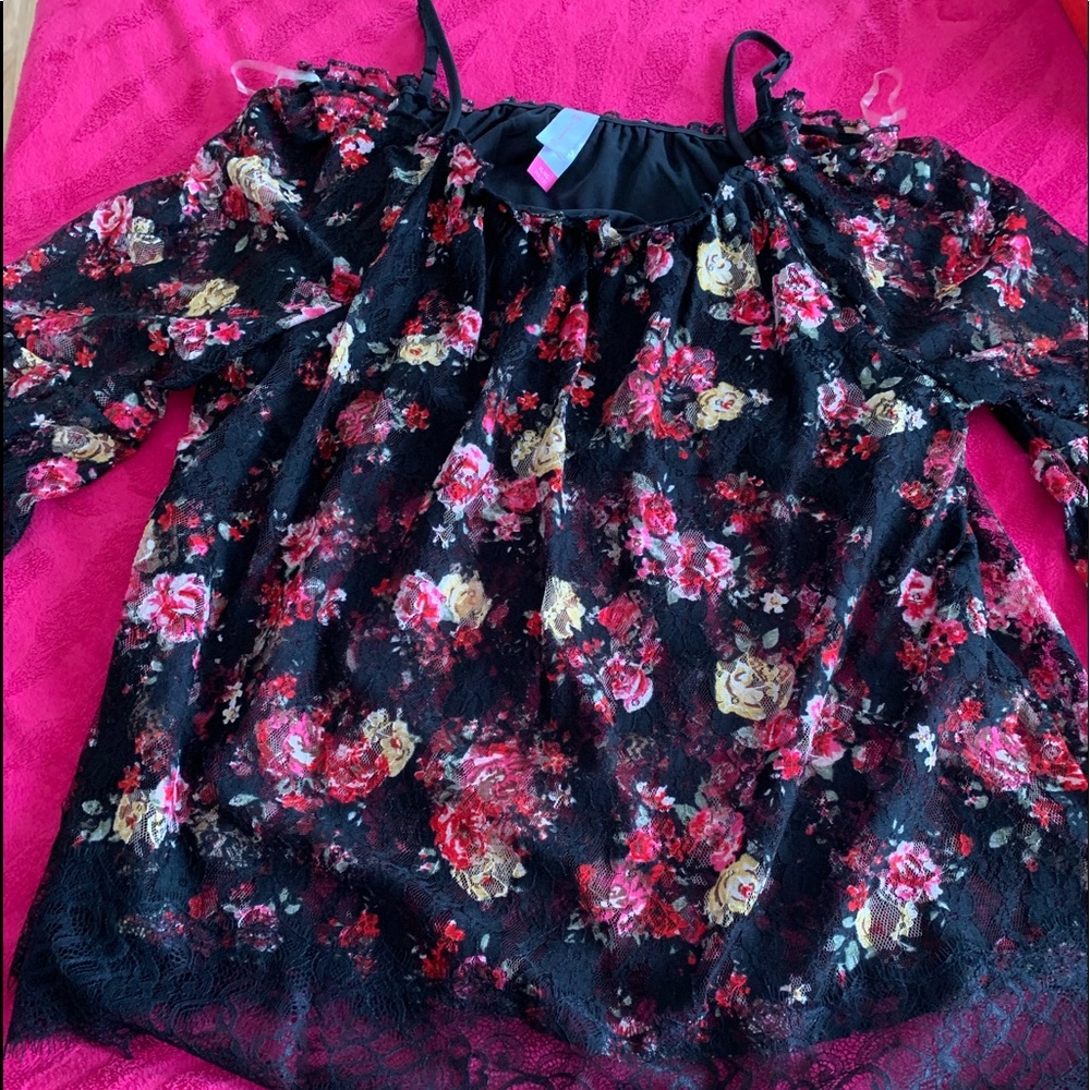 A black no boundaries flower see-through shirt